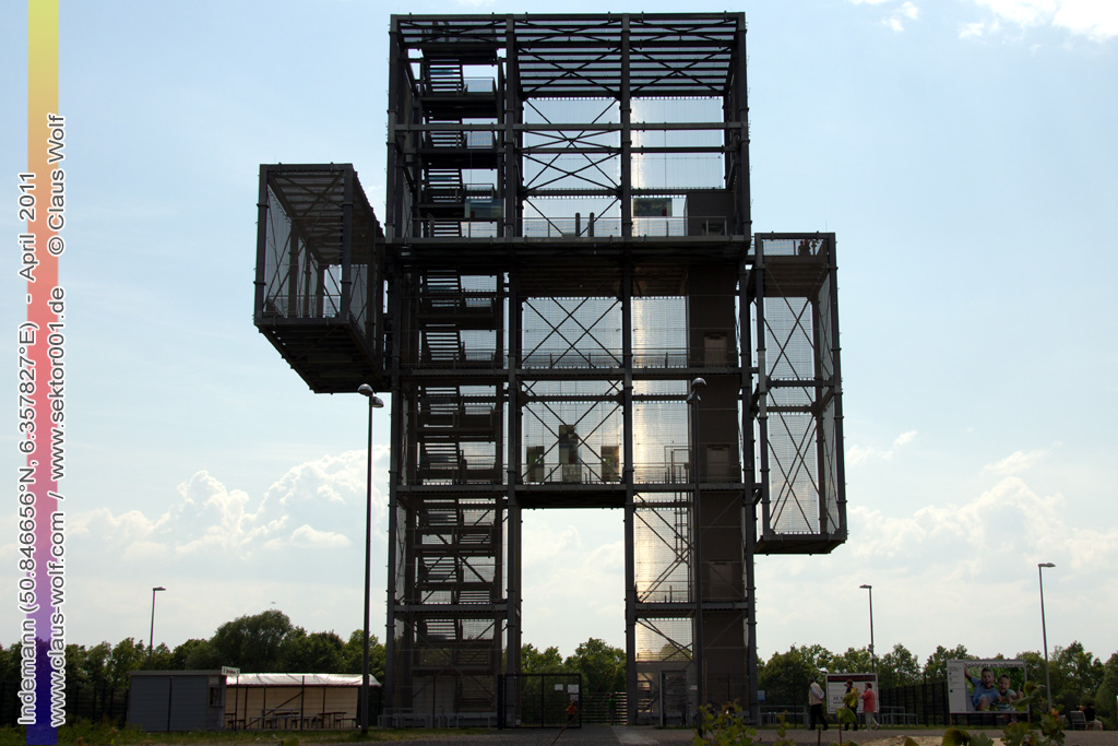 Der Indemann ist ein Aussichtsturm, der bei Lucherberg in der Gemeinde Inden im Kreis D�ren auf der Abraumhalde Goltsteinkuppe steht. Er wurde als Projekt im Rahmen der EuRegionale 2008 realisiert. Der Indemann ist eine 36 m hohe Konstruktion aus 280t Stahl mit 20.000 Einzelteilen. �ber 216 Stufen k�nnen die zw�lf verschiedenen Ebenen erreicht werden. Ein Aufzug f�hrt bis auf 24 m hinauf. Das Edelstahlgewebe, welches die Konstruktion umschlie�t, ist eine Gemeinschaftsproduktion der ag4 media facade GmbH, K�ln, und der D�rener Firma GKD Gebr�der Kufferath. 40.655 Leuchtdioden auf einer Fl�che von 1.470 m� lassen den Indemann bei Nacht zum leuchtenden Symbol des Indelandes werden.